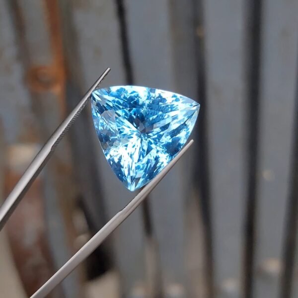 Natural Ice Blue Topaz – 34.24 Carats Trillion Cut – Sparkling Clean – Collector’s Gemstone