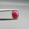 A 0.98 carat natural red Ruby (Yaqoot) from Kabul, Afghanistan, showing both front and back views to display its oval cut, rich saturation, and natural internal characteristics.
