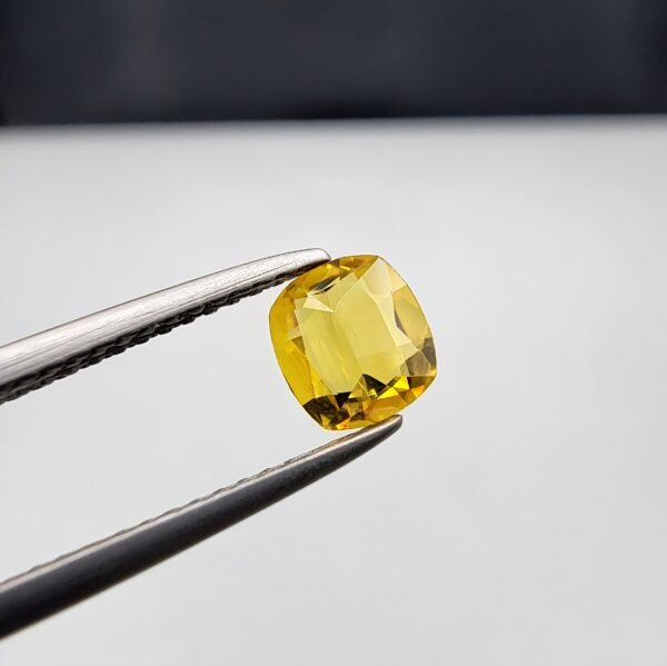 Natural Yellow Sapphire (Pukhraj) – 0.69 Carat – Origin Madagascar – Cushion Cut Gemstone