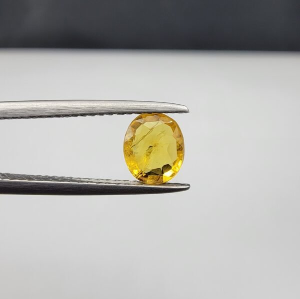Natural Yellow Sapphire (Pukhraj) – 0.78 Carat – Origin Madagascar – Oval Cut Gemstone