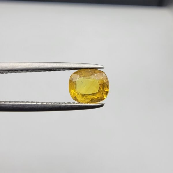 Natural Yellow Sapphire (Pukhraj) – 0.91 Carat – Origin Madagascar – Cushion Cut Gemstone