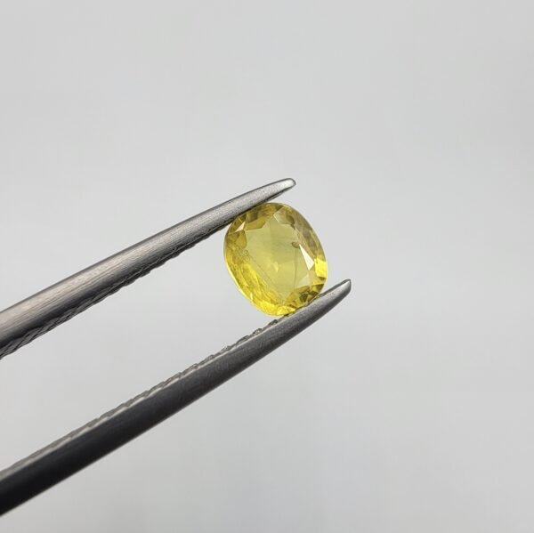 Natural Yellow Sapphire (Pukhraj) – 0.54 Carat – Origin Madagascar – Cushion Cut Gemstone
