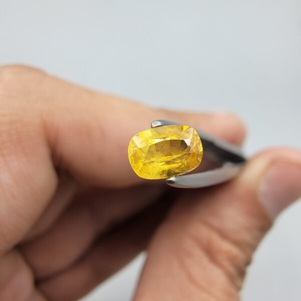 Natural Yellow Sapphire (Pukhraj) – 0.66 Carat – Origin Madagascar – Cushion Cut Gemstone