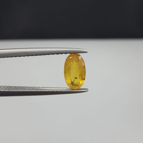 Natural Yellow Sapphire (Pukhraj) – 0.73 Carat – Origin Madagascar – Oval Cut Gemstone