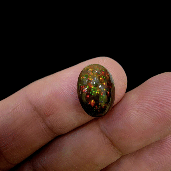 Natural Ethiopian Star Opal – 4.82 Carat – Oval Shape – Brilliant Green, Red & Yellow Fire