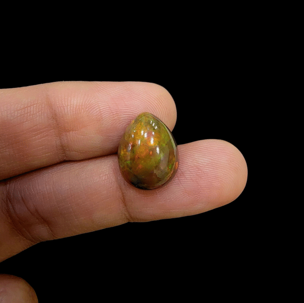 Natural Ethiopian Opal – 6.66 Carat (Lucky Number) – Pear Shape – Brilliant Green, Red & Yellow Fire