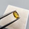 0.46 carat natural yellow sapphire gemstone (Pukhraj), oval shape/cut, sourced from Madagascar. Available for sale in Karachi, Pakistan.