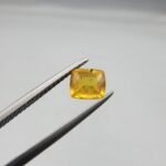 0.81 carat natural yellow sapphire gemstone (Pukhraj), cushion shape/cut, sourced from Madagascar. Available for sale in Karachi, Pakistan.
