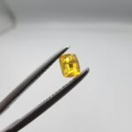 0.25 carat natural yellow sapphire gemstone (Pukhraj), square/cushion cut, sourced from Madagascar. Available for sale in Karachi, Pakistan.