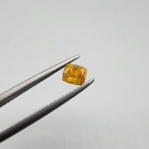 0.64 carat natural yellow sapphire gemstone (Pukhraj), square/cushion cut, sourced from Madagascar. Available for sale in Karachi, Pakistan.