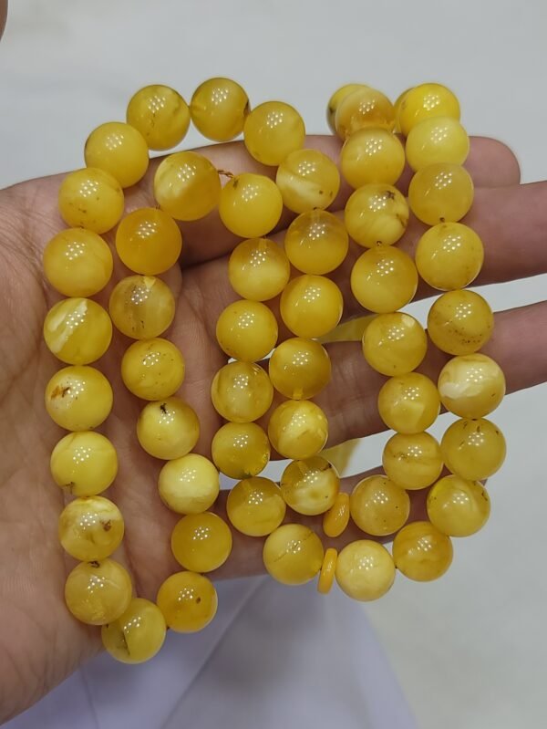Natural Baltic Amber Tasbeeh (Misbah) made from round polished yellow amber beads, Germany origin, total weight 96 grams, with traditional tassel.