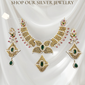 925 silver gold plated necklace and earring set weighing 98.92 grams with artificial emerald green and clear gemstones