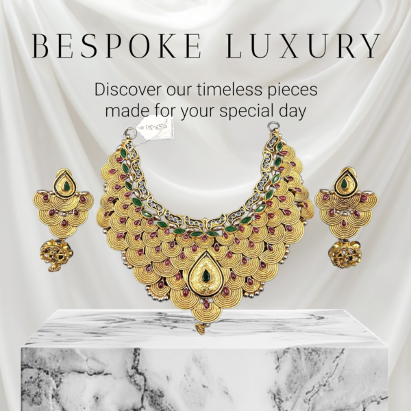 925 silver gold plated necklace and earring set weighing 115.79 grams with artificial ruby and emerald gemstones