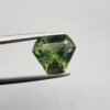 Natural rutilated peridot zabarjad 4.65 carat gemstone from Kohistan Valley Pakistan with visible rutile inclusions