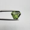 Natural rutilated peridot zabarjad 4.65 carat gemstone from Kohistan Valley Pakistan with visible rutile inclusions