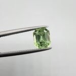 Natural rutilated peridot zabarjad 1.89 carat from Kohistan Valley Pakistan with bright green color and fine natural rutile inclusions