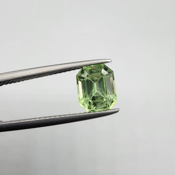 Natural rutilated peridot zabarjad 1.89 carat from Kohistan Valley Pakistan with bright green color and fine natural rutile inclusions