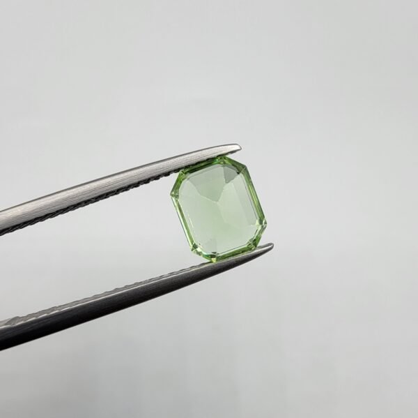 Natural rutilated peridot zabarjad 1.89 carat from Kohistan Valley Pakistan with bright green color and fine natural rutile inclusions