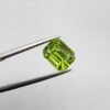 Natural rutilated peridot zabarjad 4.52 carat emerald cut from Kohistan Valley Pakistan with bright green color and visible natural inclusions