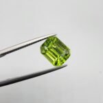 Natural rutilated peridot zabarjad 4.52 carat emerald cut from Kohistan Valley Pakistan with bright green color and visible natural inclusions