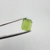 Natural rutilated peridot zabarjad 4.52 carat emerald cut from Kohistan Valley Pakistan with bright green color and visible natural inclusions