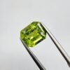 Natural Rare Peridot with Spider Web Inclusions - 5.29 Carat, Emerald Shape