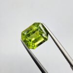 Natural Rare Peridot with Spider Web Inclusions - 5.29 Carat, Emerald Shape