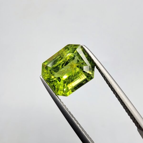 Natural Rare Peridot with Spider Web Inclusions - 5.29 Carat, Emerald Shape
