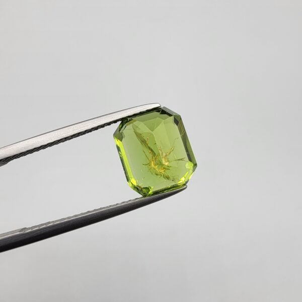 Natural Rare Peridot with Spider Web Inclusions - 5.29 Carat, Emerald Shape