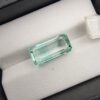 Rare 7.28 carat natural green emerald gemstone from Panjshir Valley, Afghanistan, featuring exceptional clarity and vibrant neon green hue.
