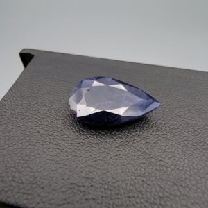 Rare 8.22 carat natural blue sapphire (Neelam) from Afghanistan, featuring a deep saturated blue hue and a classic oval cut with visible natural crystalline character.