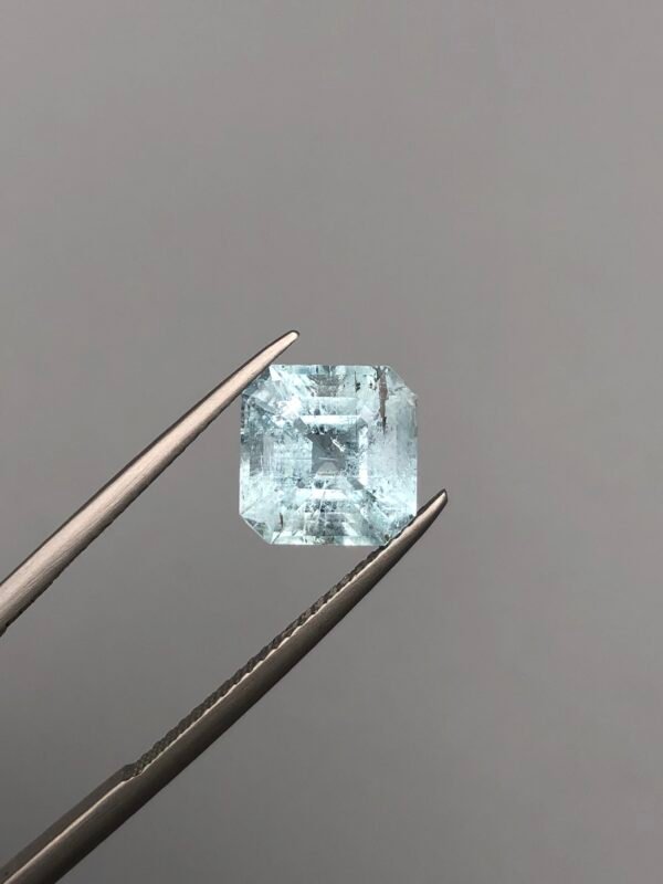 Natural icy blue aquamarine gemstone, 3.55 carats, ethically sourced from the Shigar Valley in Pakistan, displaying high transparency and vitreous luster.