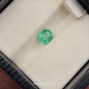 Natural 0.70 carat emerald gemstone from Afghanistan's Panjshir Valley, featuring a vivid bluish-green hue and characteristic "pencil" crystal transparency.