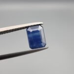 Certified 1.09 carat natural blue sapphire (Neelam) from Sri Lanka, featuring a sophisticated emerald and step cut with high-clarity crystal structure and no heat treatment.