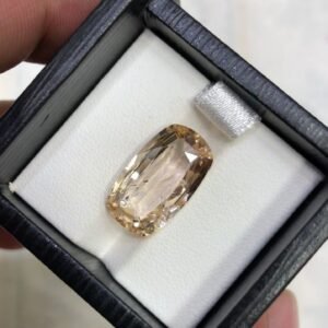 Rare 9.68 carat natural golden topaz from Katlang, Pakistan, featuring a high-clarity transparent body with a rich sun-kissed golden hue.