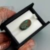 Significant 15.29 carat natural Egyptian turquoise (Feroza) oval cabochon with a rich teal-blue body and an extensive, earthy brown spiderweb matrix.