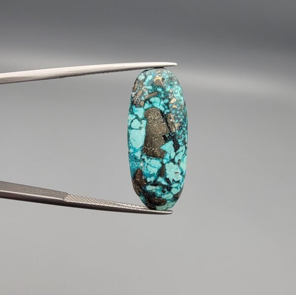 Natural Iranian Turquoise (Feroza) – 14.58 Carat – Authentic Kerman City Origin | Oval Cabochon | Shimmering Pyrite Inclusions | Brilliant Gemstone