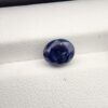 ​A 3.58-carat natural Ceylon blue sapphire with a vivid blue color and oval faceted cut, professionally displayed in a white jeweler's box.