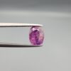 A rare 1.85-carat unheated natural purple sapphire (Khooni Neelam) from Ceylon, Sri Lanka, featuring a masterfully faceted oval cut and deep violet-purple saturation, presented in a professional white jeweler's box.