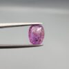 A rare 1.85-carat unheated natural purple sapphire (Khooni Neelam) from Ceylon, Sri Lanka, featuring a masterfully faceted oval cut and deep violet-purple saturation, presented in a professional white jeweler's box.