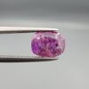A rare 1.85-carat unheated natural purple sapphire (Khooni Neelam) from Ceylon, Sri Lanka, featuring a masterfully faceted oval cut and deep violet-purple saturation, presented in a professional white jeweler's box.