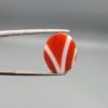 A 9.32-carat natural orangish-red Aqeeq gemstone with a prominent horizontal white band, presented in a professional jeweler's box.
