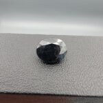 A 4.44-carat natural blue sapphire from Kanchanaburi, Thailand, featuring a classic oval faceted cut and rich royal blue color, displayed in a professional jeweler's box.