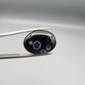 "Natural Black Sulemani Aqeeq Agate oval cabochon gemstone 14.37 carat with three natural eye spots, front and back view"