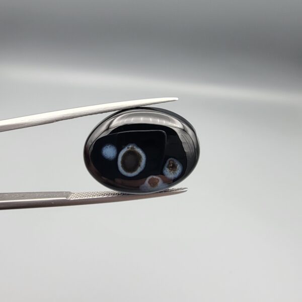 "Natural Black Sulemani Aqeeq Agate oval cabochon gemstone 14.37 carat with three natural eye spots, front and back view"