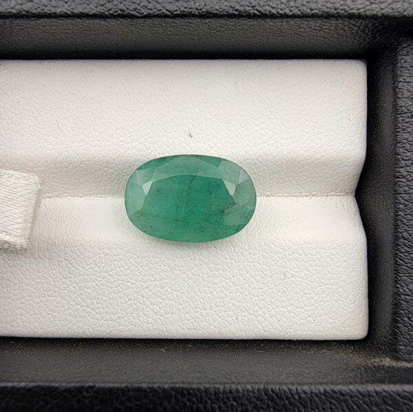 Gemstone: Natural Emerald (Panna/Zamrud) Weight: 6.47 Carats Shape & Cut: Oval, Faceted Color: Soft, Even Green Origin: Zambia Clarity: Natural Jardin Inclusions Present (Confirms Authenticity) Use: Statement Rings, Pendants, Vedic Astrology (Mercury/Budh Stone) Rarity: Large Size, Genuine Natural Color