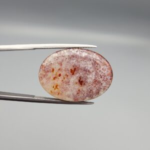 Natural Fire Agate oval cabochon 18.52 carat with orange honeycomb texture and druzy quartz crystals from Iran