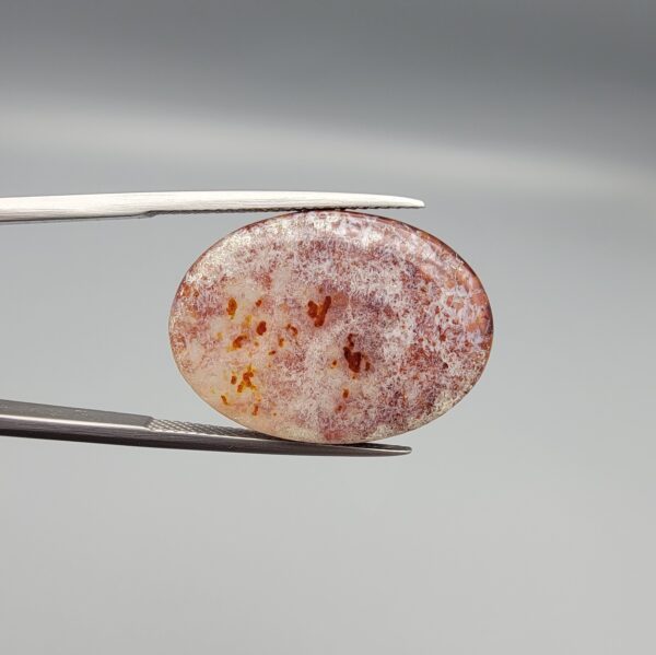 Natural Fire Agate oval cabochon 18.52 carat with orange honeycomb texture and druzy quartz crystals from Iran