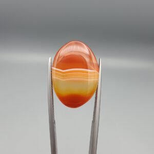 Natural orange and yellow banded chalcedony agate oval cabochon 18.26 carat from Iran