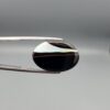 Natural Black Sulemani Agate oval cabochon 21.86 carat gemstone from Iran with white banded eye stripe